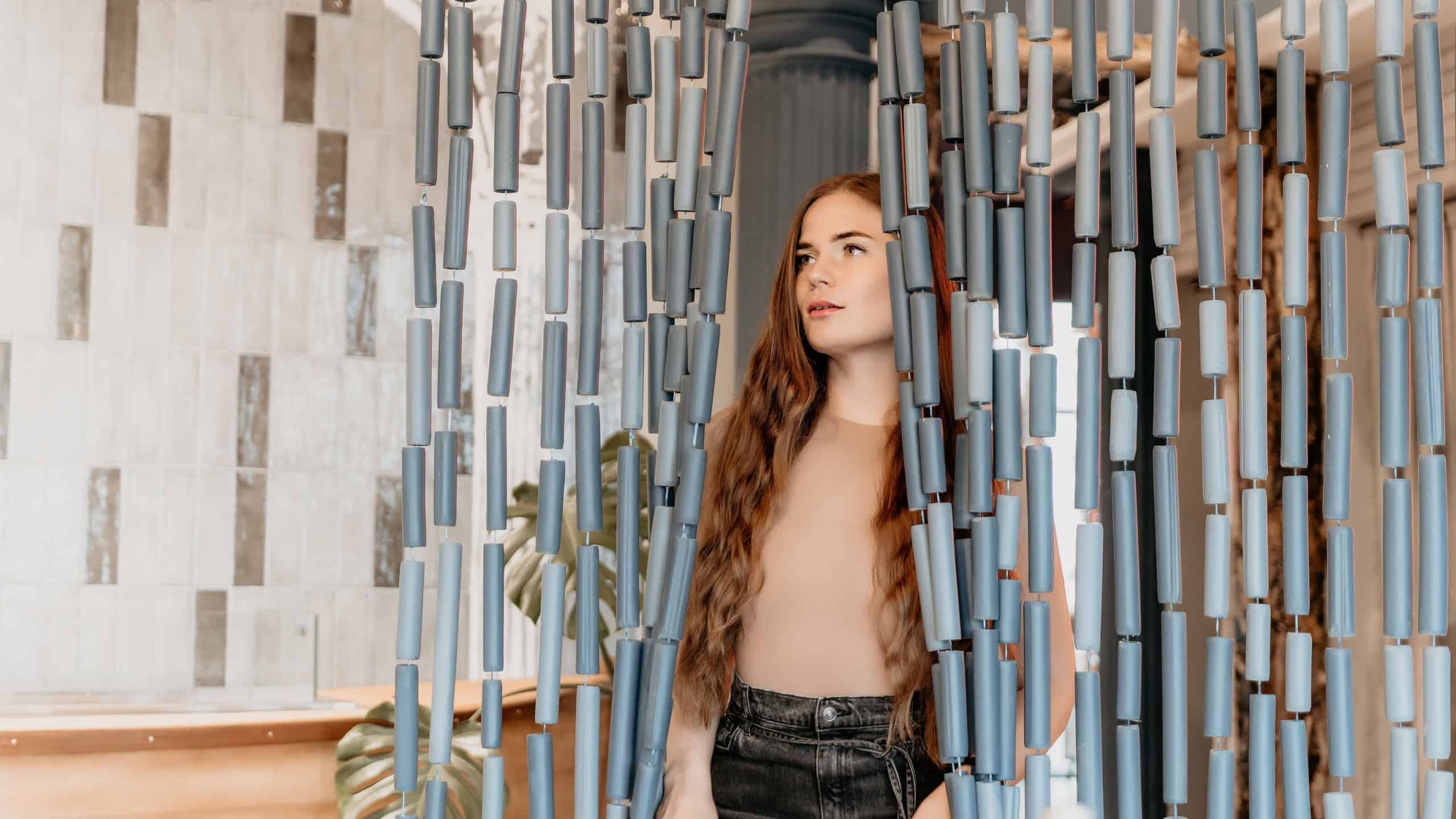 Woman Curtain Interior Design Serene Girl Behind Blue Curtain Artistic Room Divider